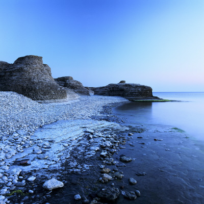 Pebbles, Stones And Cliffs By The Sea by Jorgen Larsson Pricing Limited Edition Print image