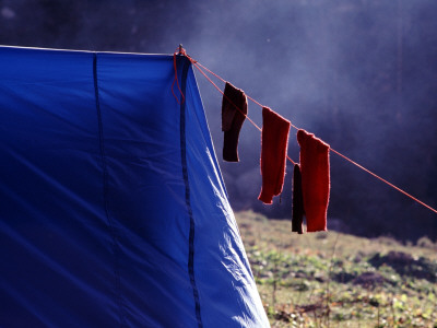 Socks Drying Outside A Tent by Bjorn Wiklander Pricing Limited Edition Print image