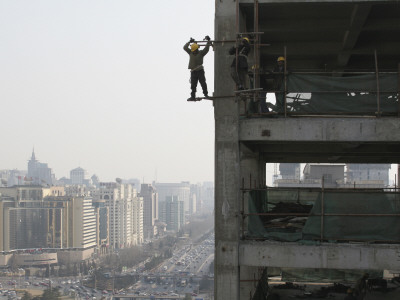 Construction Worker Hangs Off Side Of Cyts Hq Under Construction In Dongzhimen, Central Beijing by Ben Mcmillan Pricing Limited Edition Print image