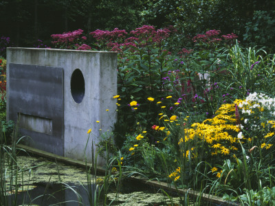 Concrete Sculpture Beside Lily Pond, Designer: Duncan Heather, Greystone Cottage, Oxfordshire by Clive Nichols Pricing Limited Edition Print image