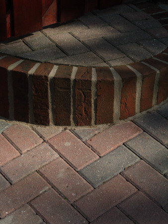 Backgrounds - Detail Of Red Clay Herring Bone Pattern Paviors By Soldier Course Of Bricks by Natalie Tepper Pricing Limited Edition Print image