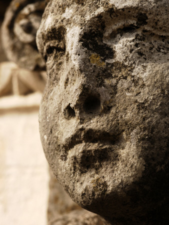 Stone Carving Of A Face On The Original Villa Building, Aci Marina, Dubrovnik, Croatia by Olwen Croft Pricing Limited Edition Print image