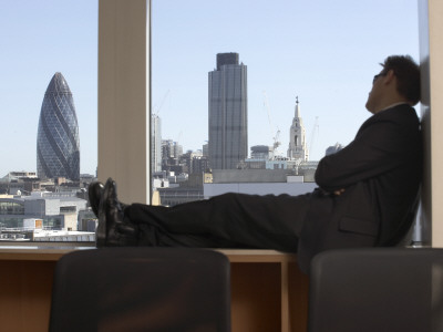 Office Life And Interiors Part Two, Man Taking A Nap By Office Window by Richard Bryant Pricing Limited Edition Print image
