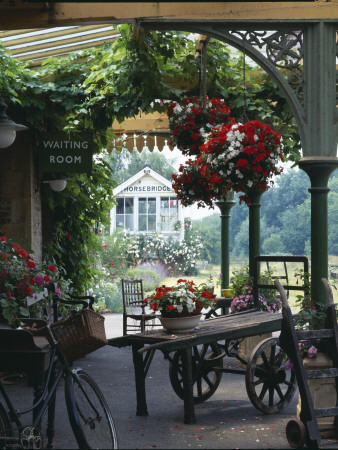 Converted Station With Hanging Baskets by Richard Waite Pricing Limited Edition Print image