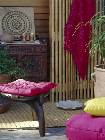 Ethnic Patio With Cushioned Stool And Bamboo Screen by Richard Powers Pricing Limited Edition Print image