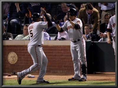 Texas Rangers V. San Francisco Giants, Game 5:  Juan Uribe, Andres Torres by Christian Petersen Pricing Limited Edition Print image