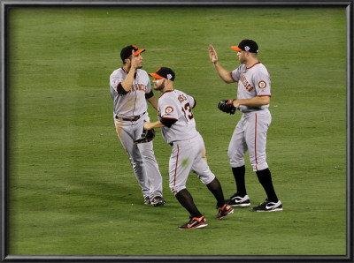 San Francisco Giants V Texas Rangers, Game 4: Nate Schierholtz,Cody Ross,Andres Torres by Stephen Dunn Pricing Limited Edition Print image