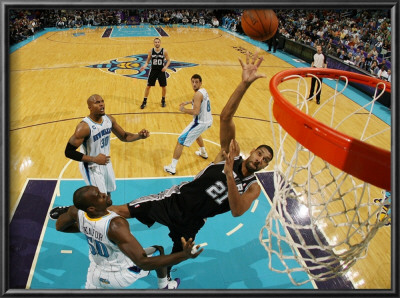 San Antonio Spurs V New Orleans Hornets: Tim Duncan And Emeka Okafor by Chris Graythen Pricing Limited Edition Print image