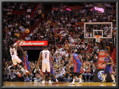 Detroit Pistons V Miami Heat: Dwyane Wade And Will Bynum by Mike Ehrmann Pricing Limited Edition Print image