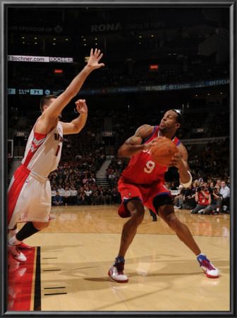 Philadelphia 76Ers V Toronto Raptors: Andre Iguodala And Linas Kleiza by Ron Turenne Pricing Limited Edition Print image