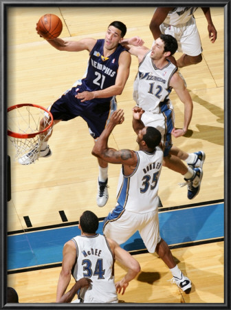 Memphis Grizzlies V Washington Wizards: Greivis Vasquez And Kirk Hinrich by Ned Dishman Pricing Limited Edition Print image