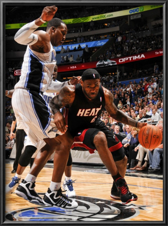 Miami Heat V Orlando Magic: Lebron James And Dwight Howard by Fernando Medina Pricing Limited Edition Print image