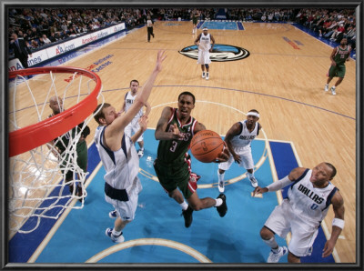 Milwaukee Bucks V Dallas Mavericks: Brandon Jennings And Dirk Nowitzki by Glenn James Pricing Limited Edition Print image