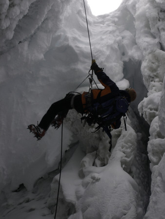 Climber In Crevasse, Switzerland by Michael Brown Pricing Limited Edition Print image