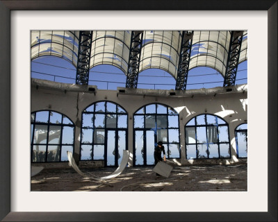 The Shattered Windows Of An Empty Resort Are Seen Following An Explosion by Hatem Moussa Pricing Limited Edition Print image