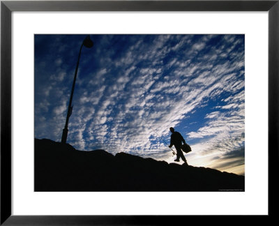 Fisherman Walking Along Sea Wall At Altona Beach, Melbourne, Australia by Will Salter Pricing Limited Edition Print image