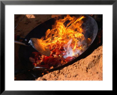 Cooking In Wok Over Camp Fire Simpson Desert, Australia by John Hay Pricing Limited Edition Print image