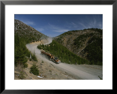 Log Trucks Carry Old Growth Logs Down A Mountain by James P. Blair Pricing Limited Edition Print image