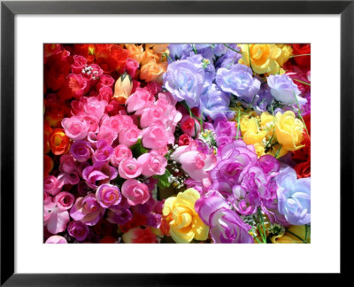 Bright And Colorful Array Of Silk Flowers At An Outdoor Flea Market by Stephen St. John Pricing Limited Edition Print image