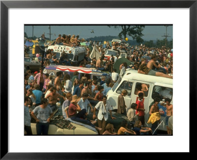 Crowd Of People, Some Sitting On Top Of Cars And Busses, During The Woodstock Music/Art Fair by John Dominis Pricing Limited Edition Print image