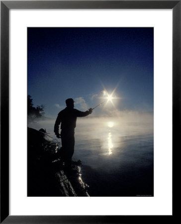 Silhouette Of Fisherman Casting A Line Into Lake, Ontario, Canada by Mark Carlson Pricing Limited Edition Print image