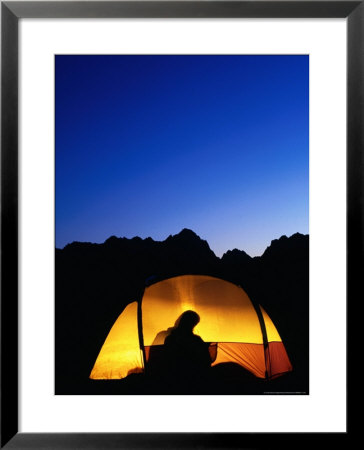 Camper Reading By Lantern In Tent At Dusk, Yosemite National Park, Usa by Woods Wheatcroft Pricing Limited Edition Print image