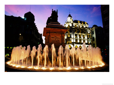 Fountain And City Square At Dusk, Granada, Spain by Jonathan Chester Pricing Limited Edition Print image