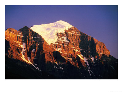 Snow-Covered Summit Of Mt. Temple At Sunset In Summer, Banff National Park, Canada by David Tomlinson Pricing Limited Edition Print image