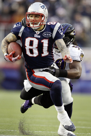 Baltimore Ravens And New England Patriots - Jan. 22, 2012: Aaron Hernandez And Dannell Ellerbe by Matt Slocum Pricing Limited Edition Print image