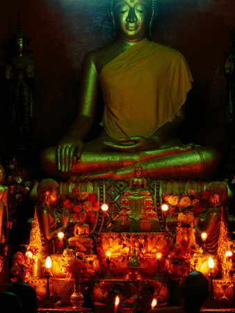 Candles And Offerings In Front Of Seated Buddha Statue, Khili Temple, Luang Prabang, Laos by Alain Evrard Pricing Limited Edition Print image