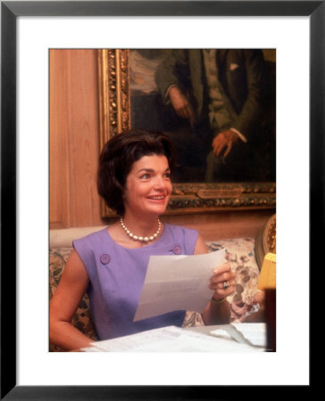 First Lady Jacqueline Kennedy Looking Over Some Papers At The White House by Ed Clark Pricing Limited Edition Print image