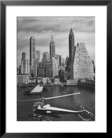 Nyc Police Helicopter Passing Over Downtown Skyport On The Waterfront In Lower Manhattan by Margaret Bourke-White Pricing Limited Edition Print image