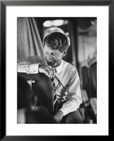 Senator Robert F. Kennedy Aboard Plane Traveling To Campaign For Local Democrats by Bill Eppridge Pricing Limited Edition Print image
