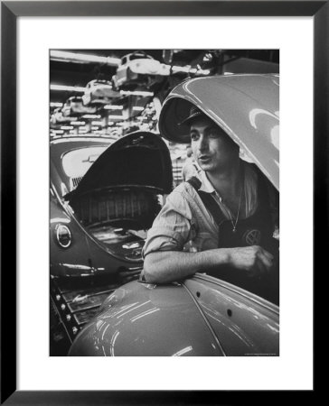 One Of Many Italian Immigrants Working In Volkswagen Plant by Paul Schutzer Pricing Limited Edition Print image