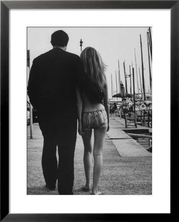Two People At The Cannes Film Festival by Paul Schutzer Pricing Limited Edition Print image