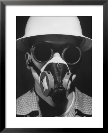 Closeup A A Man Wearing A Safety Helmet, Mask And Goggles by Andreas Feininger Pricing Limited Edition Print image