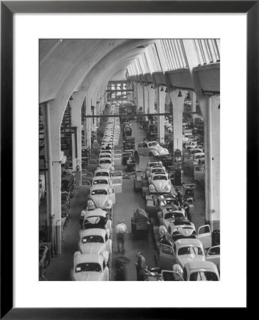 Interior View Of Volkswagen Plant, Showing Assembly Lines by Walter Sanders Pricing Limited Edition Print image