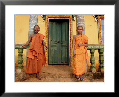 Young Buddhist Novices Relax Outside Their Temple In Sen Monorom, Cambodia, Southeast Asia by Andrew Mcconnell Pricing Limited Edition Print image