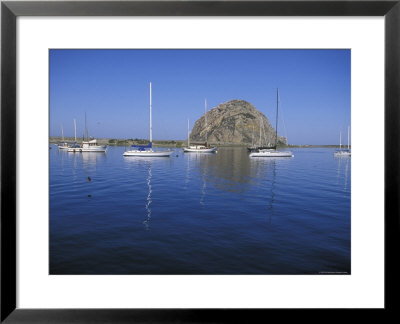 Sailboats Anchored In Morro Bay In Front Of Morro Rock, California by Rich Reid Pricing Limited Edition Print image