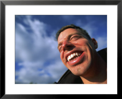 Young Man Smiles For The Camera by Joel Sartore Pricing Limited Edition Print image