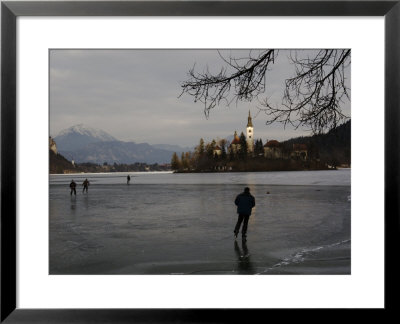 Hockey Players Brave The Cold And The Thin Ice For An Afternoon Game, Bled, Slovenia by Melissa Farlow Pricing Limited Edition Print image