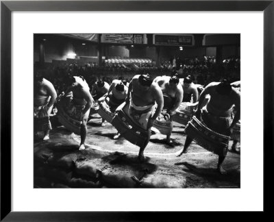 Sumo Wrestlers Performing A Ritual Dance Before A Demonstration Match by Bill Ray Pricing Limited Edition Print image