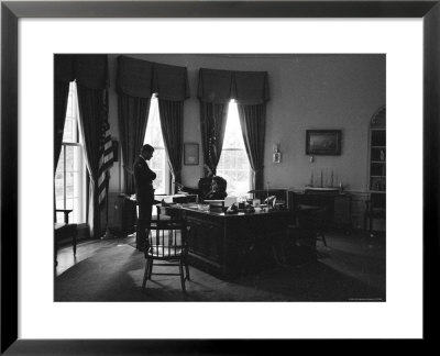 President John F. Kennedy Speaking With Brother, Attorney General Robert F. Kennedy by Art Rickerby Pricing Limited Edition Print image
