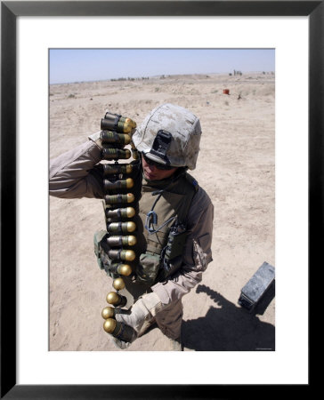 A Marine Handles A String Of 40 Mm High-Explosive Grenades by Stocktrek Images Pricing Limited Edition Print image