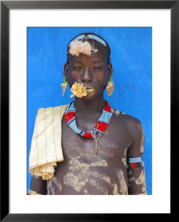Tsemay Man With Flower In Mouth At Weekly Market, Key Afir, Lower Omo Valley, Ethiopia, Africa by Jane Sweeney Pricing Limited Edition Print image
