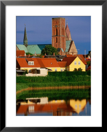 Ribe Domkirke And Town Buildings Reflected In Water, Ribe, Denmark by John Elk Iii Pricing Limited Edition Print image