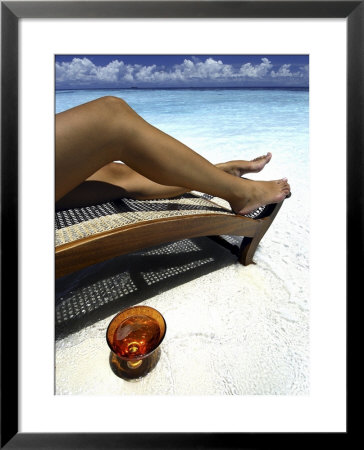 Woman Sunbathing On Beach, Kandholhudu, Ari Atoll, Alifu, Maldives by Felix Hug Pricing Limited Edition Print image