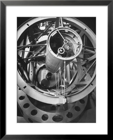 Astronomer Edwin Hubble Pictured Inside The Workings Of The Huge 200 In. Mt. Palomar Telescope by J. R. Eyerman Pricing Limited Edition Print image