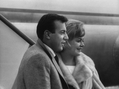 Singer Bobby Darin With Wife, Actress Sandra Dee, As They Arrive At Lax by Allan Grant Pricing Limited Edition Print image