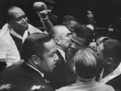 Boxer Sugar Ray Robinson Raising His Hand In Victory After Winning A Match by Grey Villet Pricing Limited Edition Print image